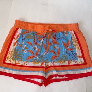 Bold pattern blue, orange and red print shorts. Drawstring waist. Size M